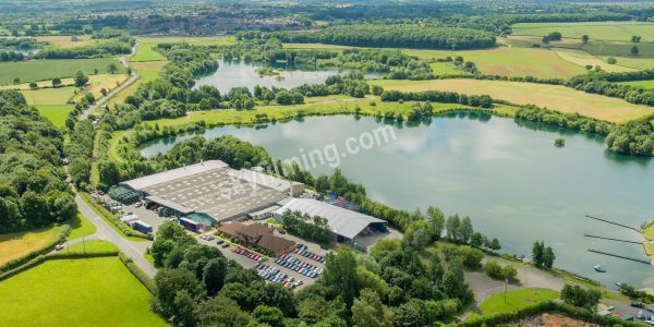 Treves factory from corner showing end of lake, drone aerial photograph