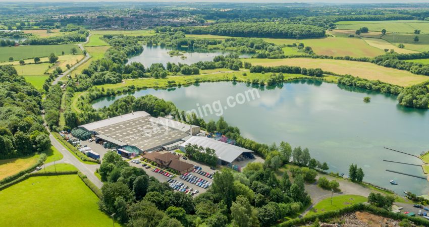 Treves factory from corner showing end of lake, drone aerial photograph