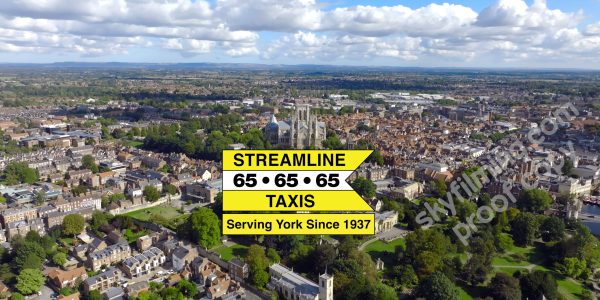 Drone and ground camera filming and video editing York taxi company promo videos York Minster view