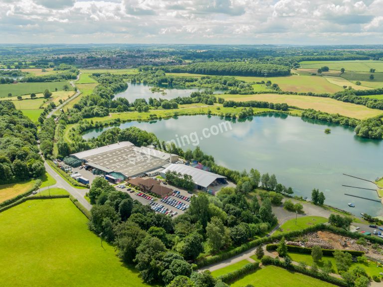 Treves factory from corner showing end of lake, drone aerial photograph