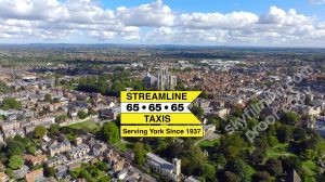Drone and ground camera filming and video editing York taxi company promo videos York Minster view